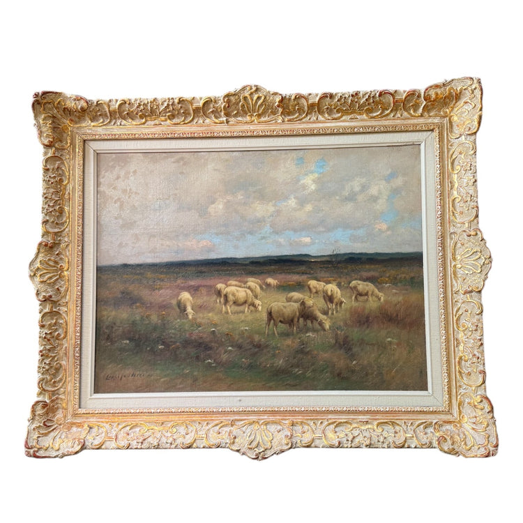 "Wyoming Sheep" oil painting by Carleton Wiggins (1848–1932), showing sheep grazing in a meadow, framed in ornate gold frame.
