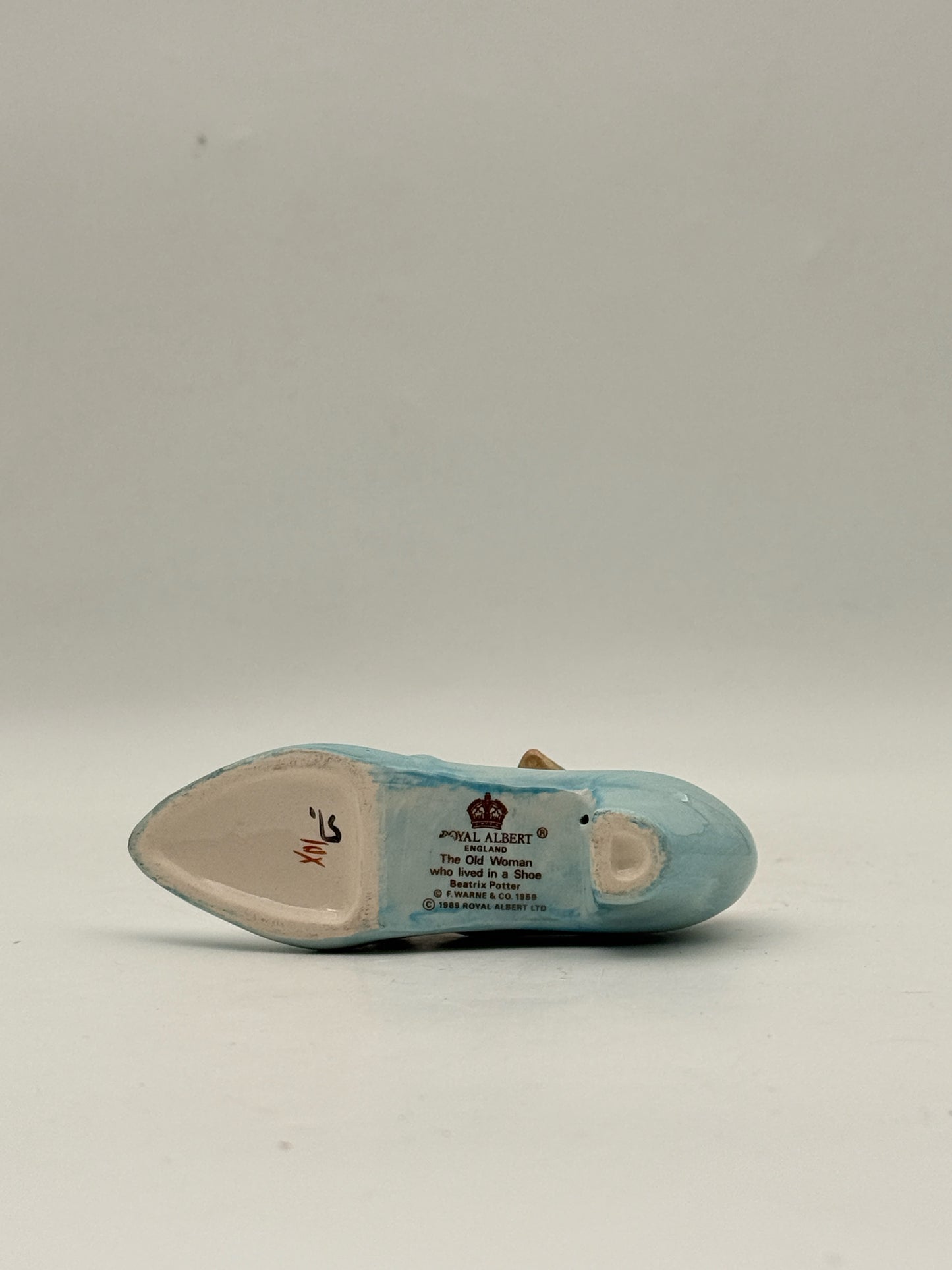 Royal Albert Beatrix Potter Figurine- The Old Woman Who Lived In A Shoe