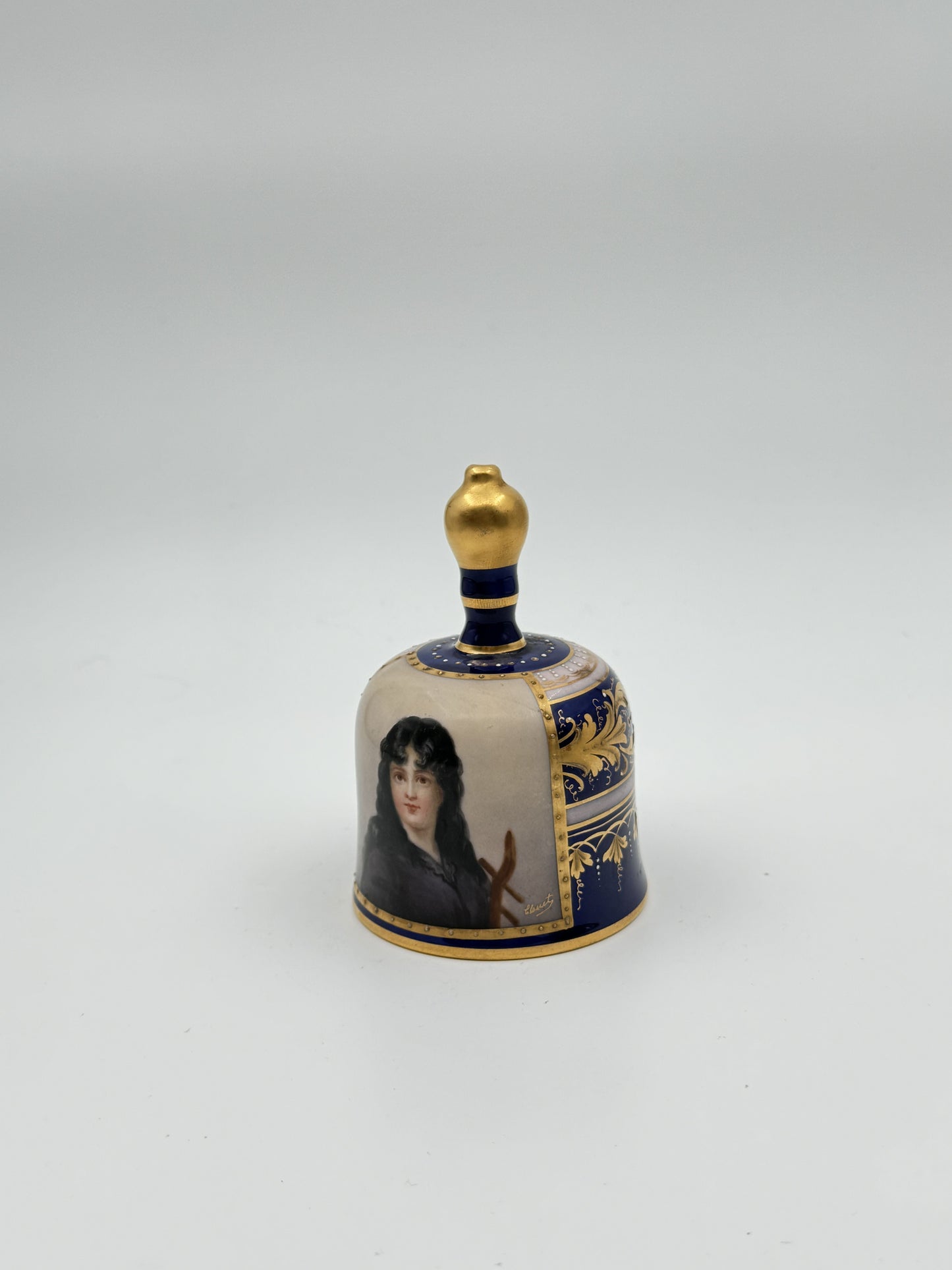 Rudolstadt German Porcelain Dinner Bell – “Beggar’s Wife” Portrait