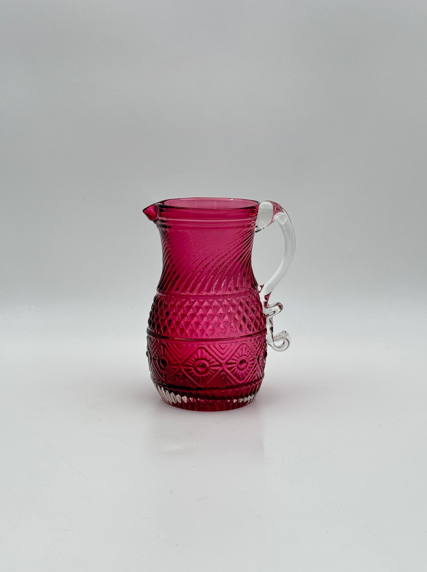 Burgundy Pressed Glass Cream Pitcher with Clear Scroll Handle