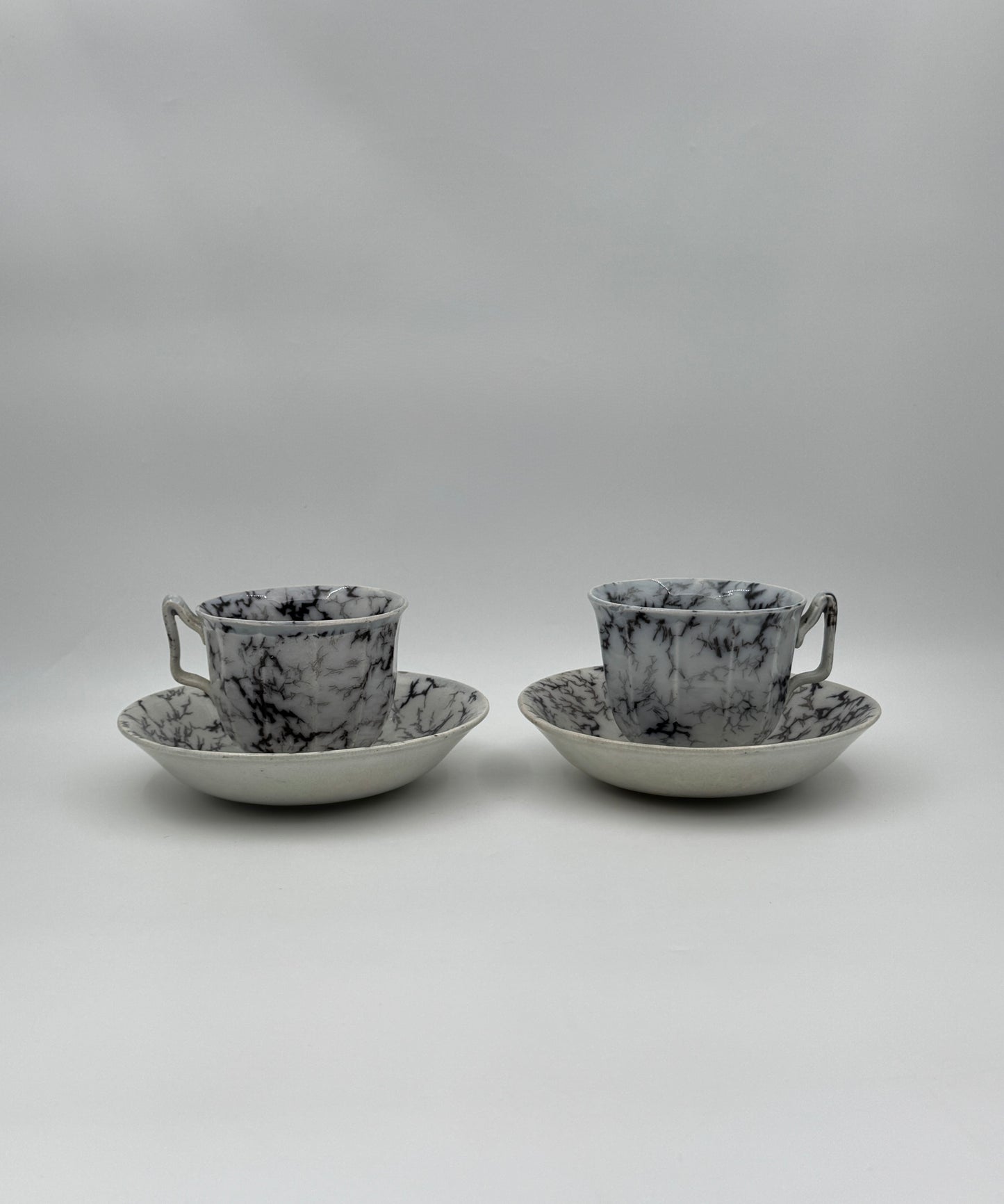 Pair of Ironstone Mocha Ware Cups & Saucers – England, 19th Century