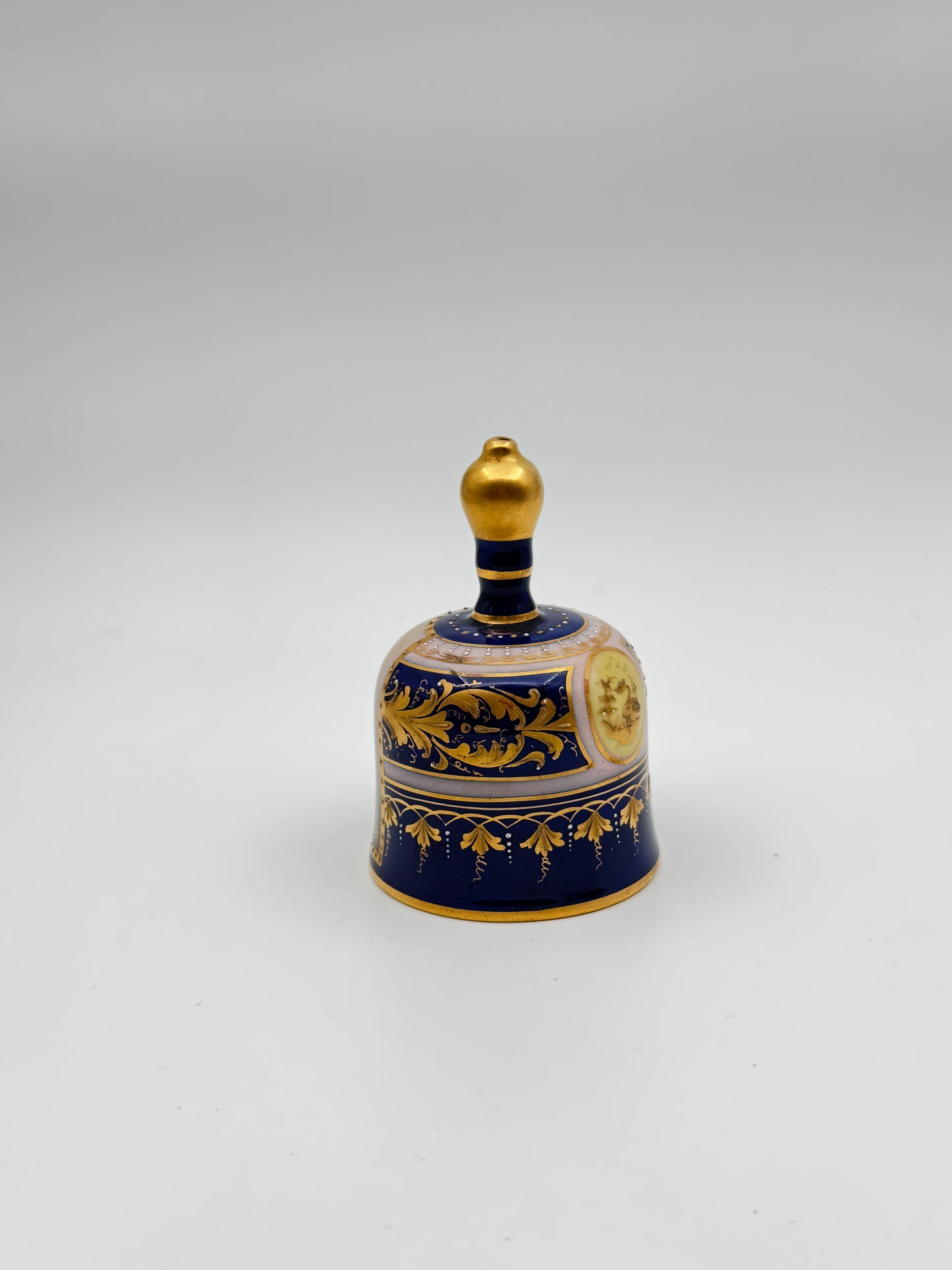 Rudolstadt German Porcelain Dinner Bell – “Beggar’s Wife” Portrait