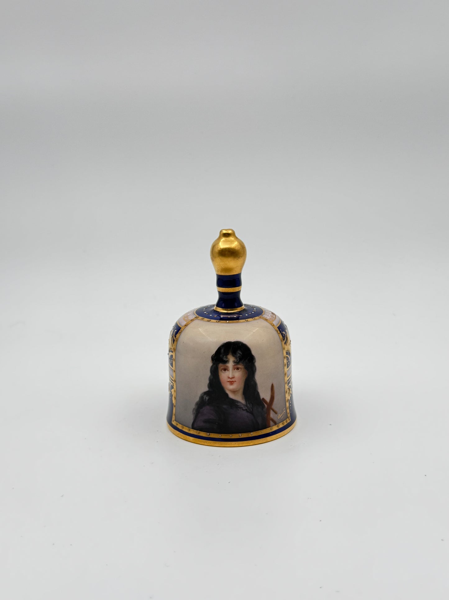 Rudolstadt German Porcelain Dinner Bell – “Beggar’s Wife” Portrait