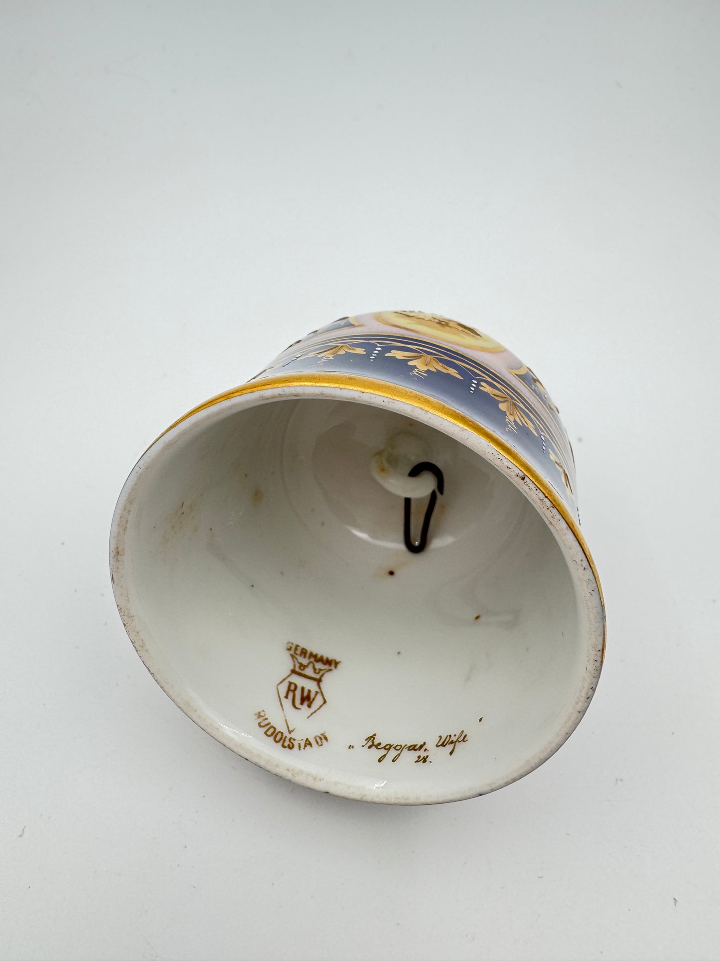 Rudolstadt German Porcelain Dinner Bell – “Beggar’s Wife” Portrait