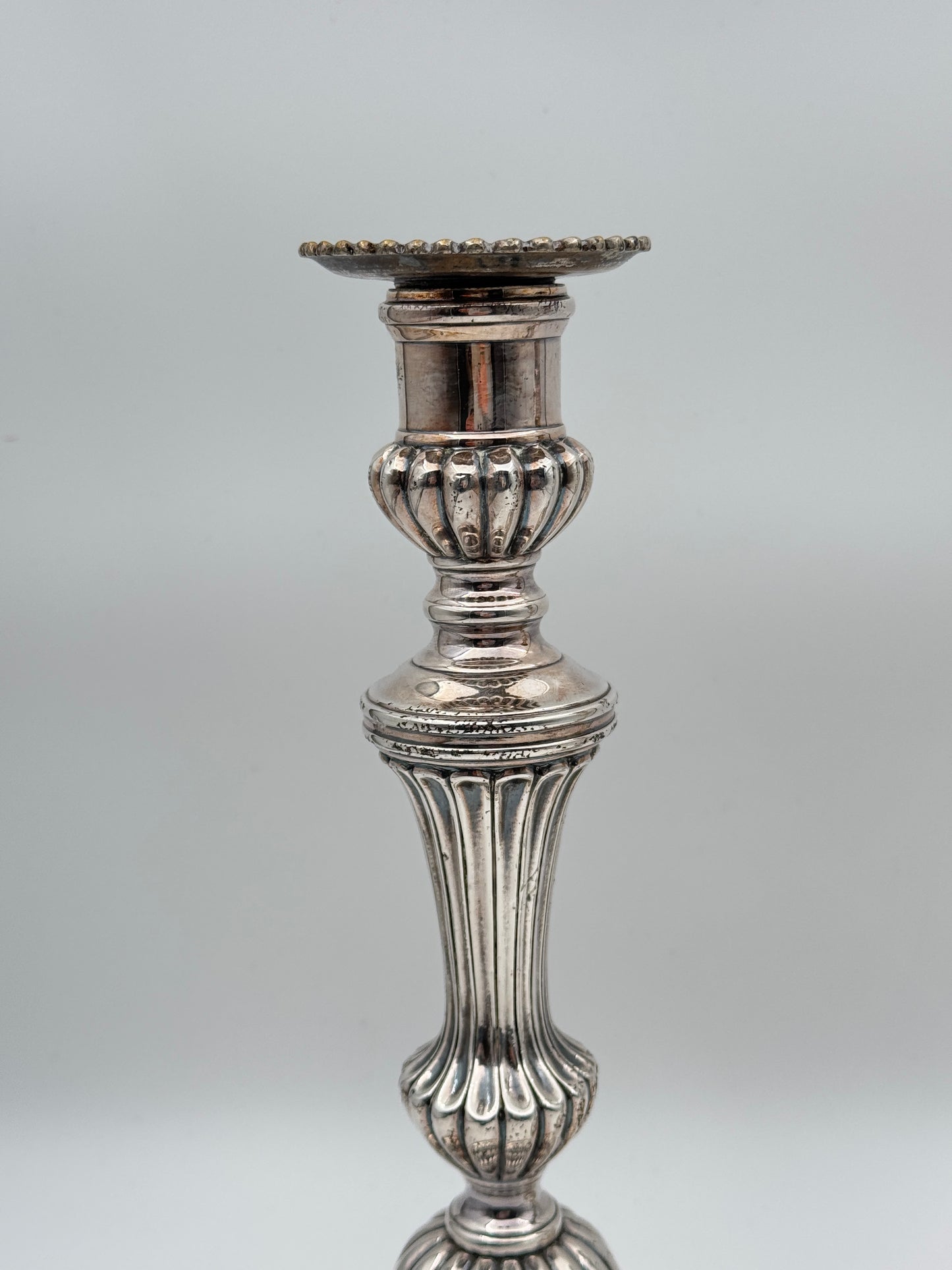 Pair of Louis XVI Style Silvered Metal Candlesticks – Elegant Neoclassical Design