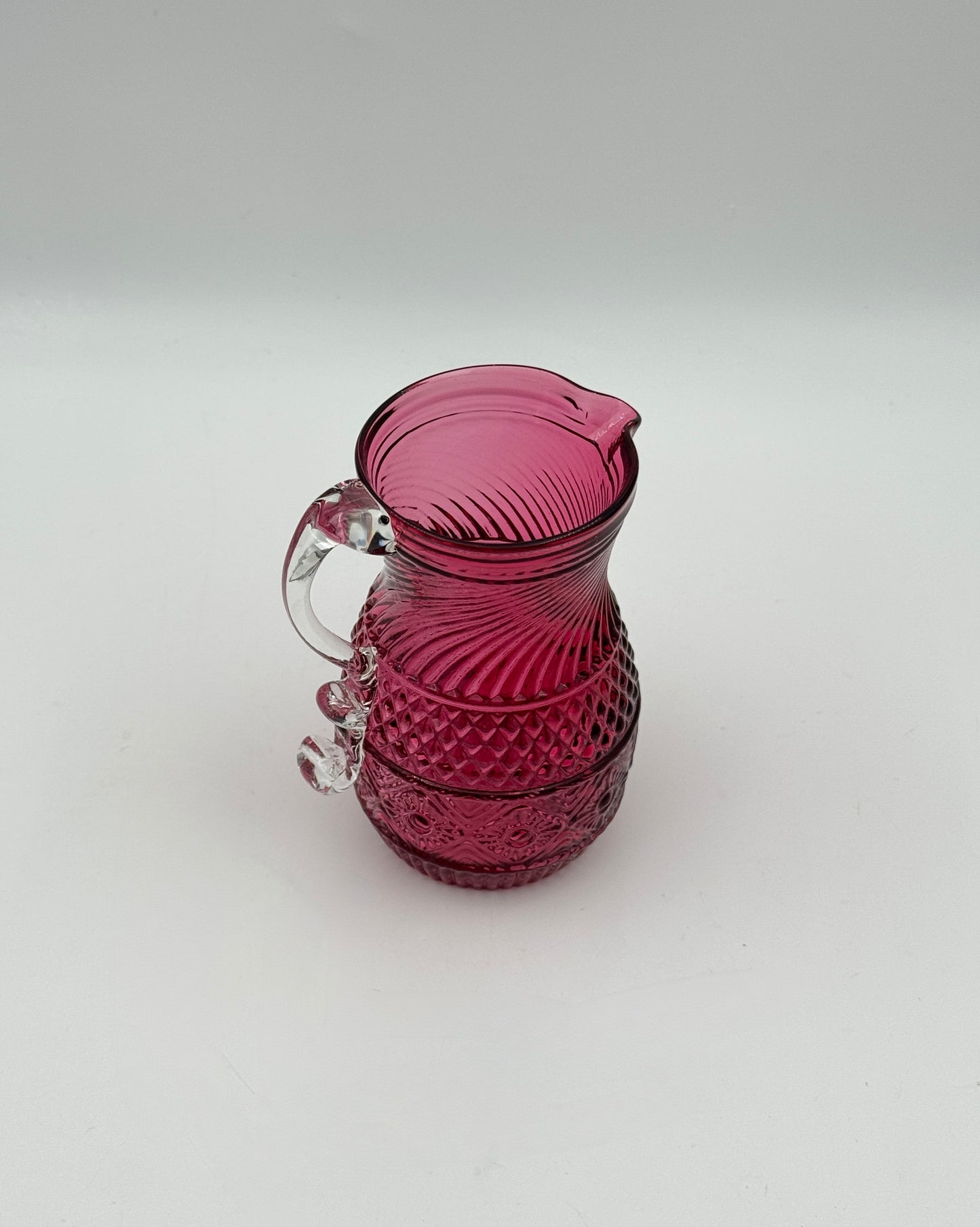 Burgundy Pressed Glass Cream Pitcher with Clear Scroll Handle