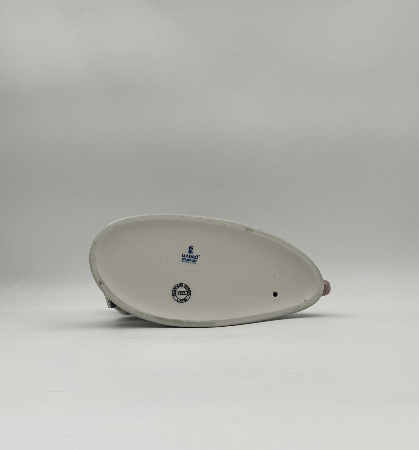 Lladró “All Aboard” #7619 Boy with Train Figurine