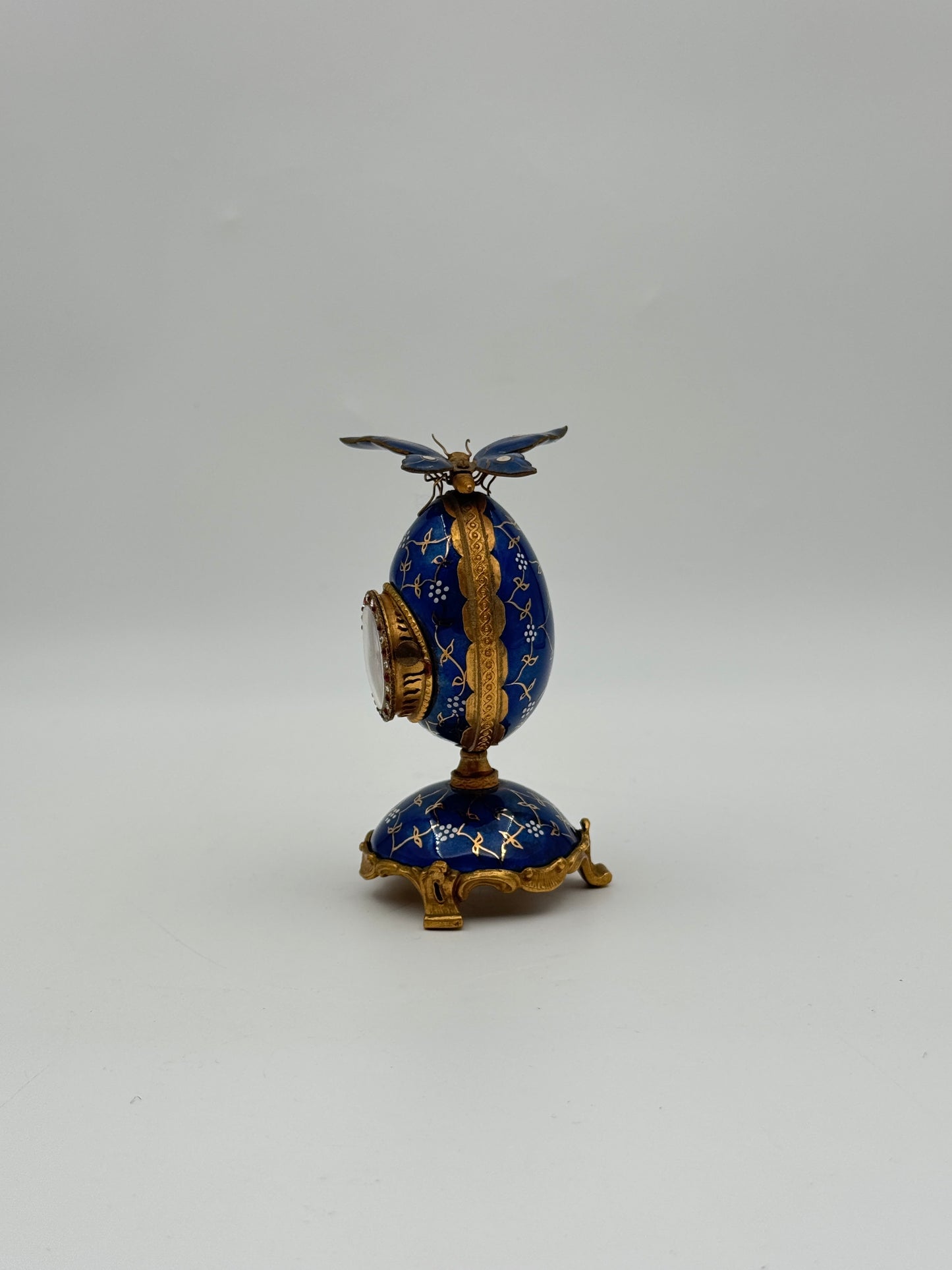 Blue Enamel Egg Clock with Butterfly Top – Gilt Accents