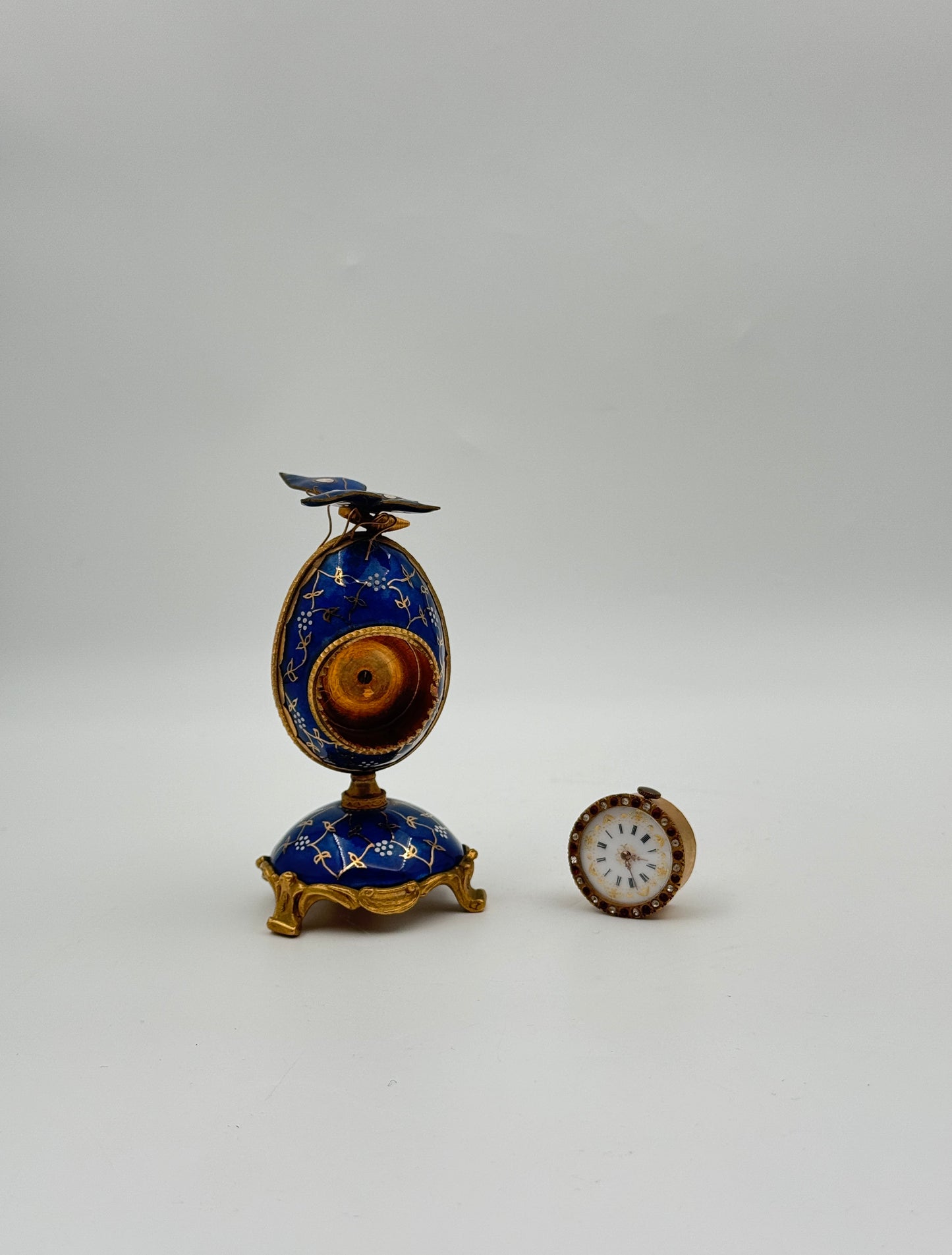 Blue Enamel Egg Clock with Butterfly Top – Gilt Accents