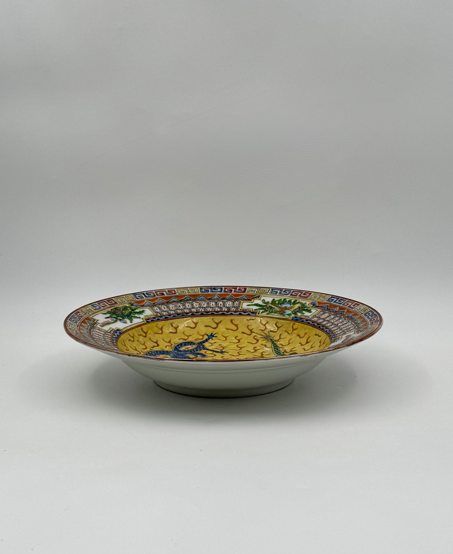 Pair of Chinese Rimmed Bowls with Dragon Motifs