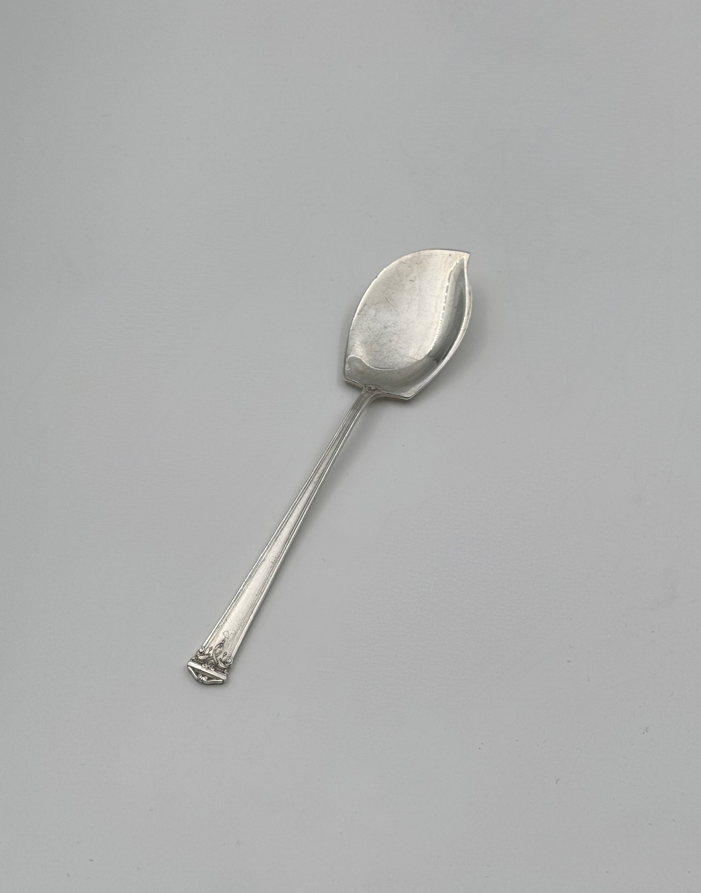 Sterling Silver Jelly Spoon – “Trianon” by Simpson, Hall & Miller