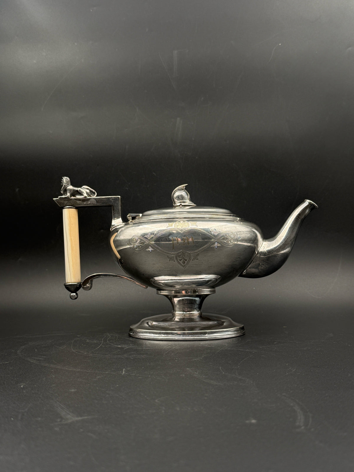 Meriden Silverplate Teapot With A Bone Handle And Sphinx Detail