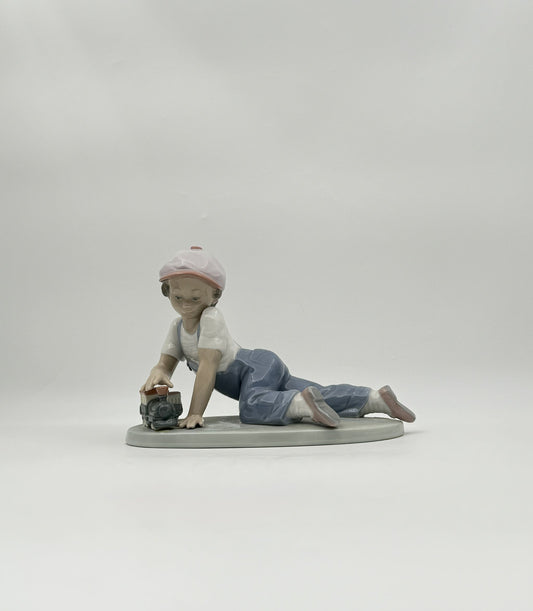 Lladró “All Aboard” #7619 Boy with Train Figurine