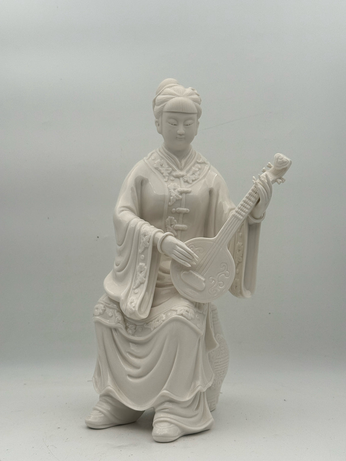 White Porcelain Woman Playing A Shamisen Figurine