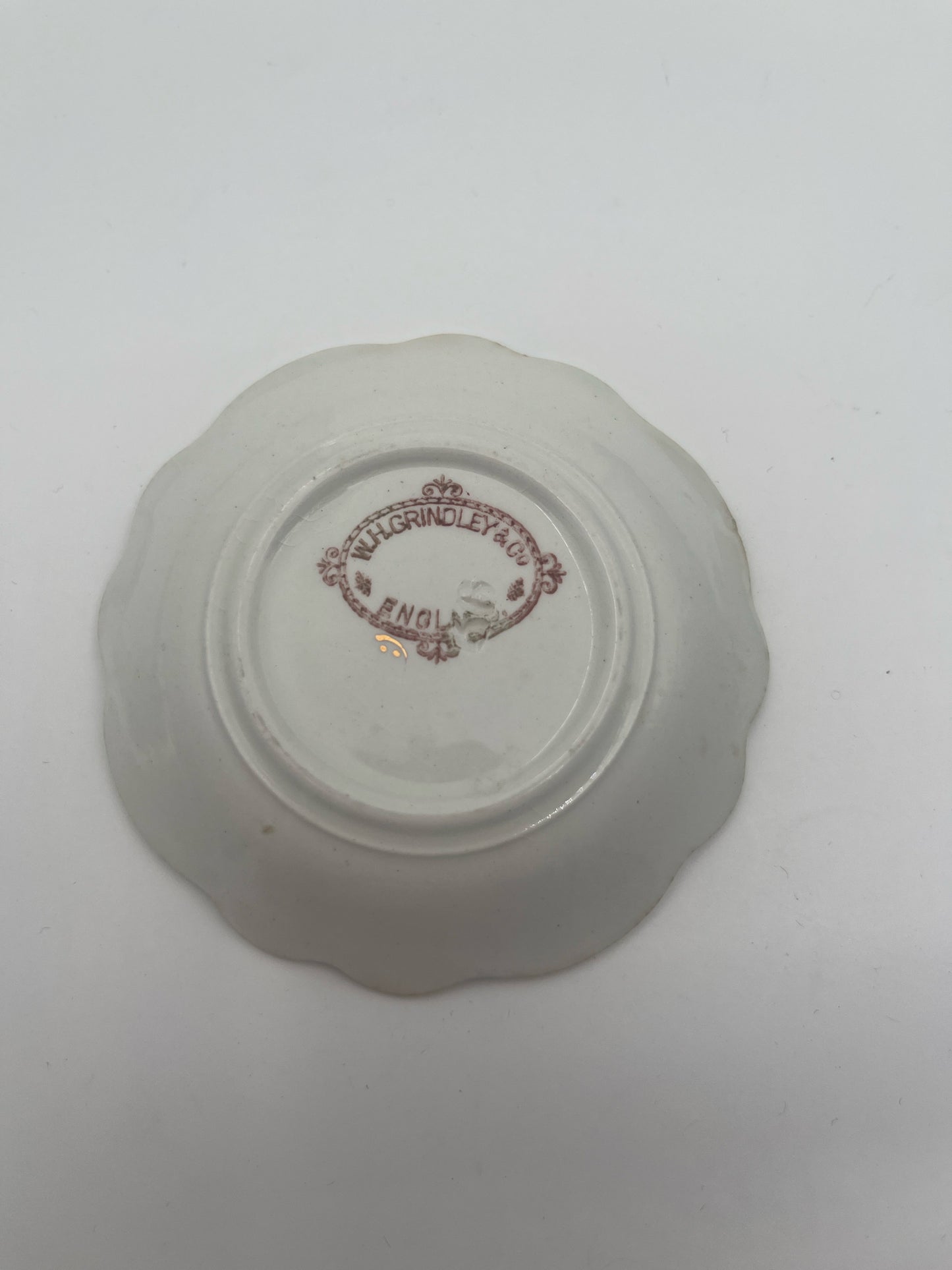 W.H. Grindley English Butter Pat – Green Rim with Floral Motif