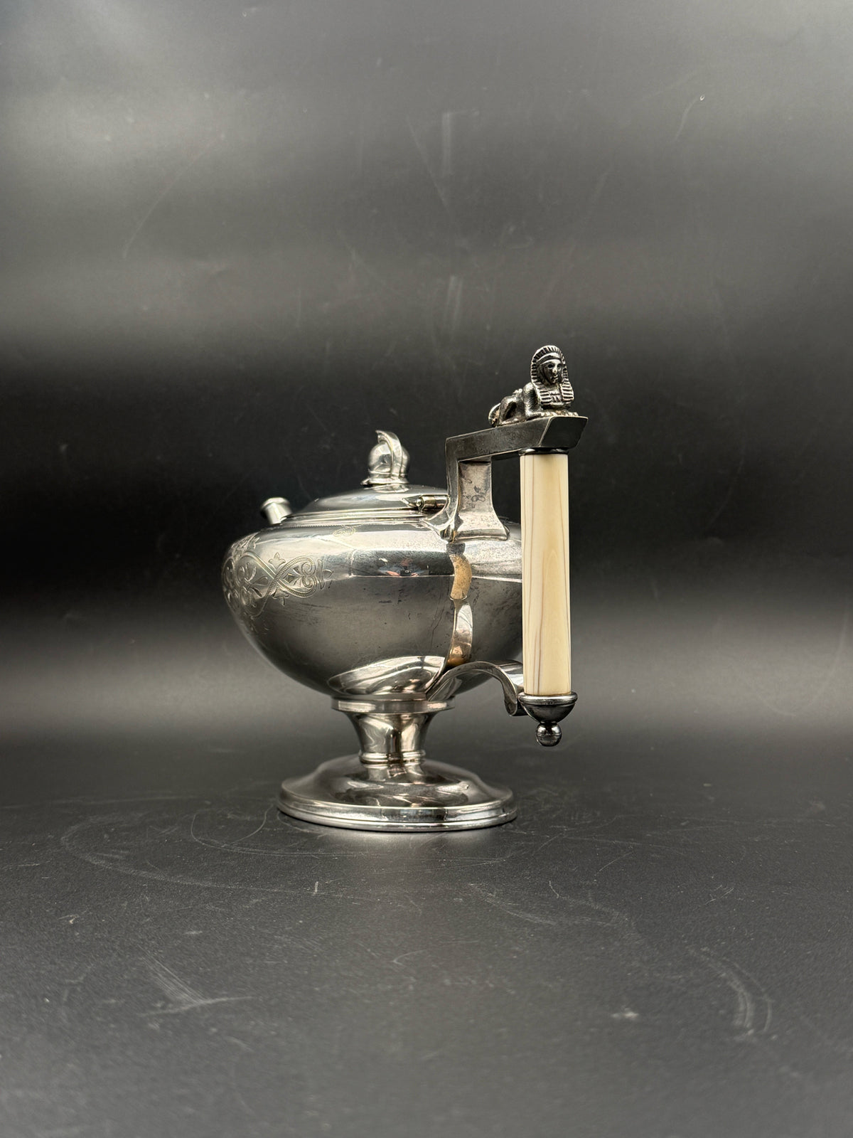 Meriden Silverplate Teapot With A Bone Handle And Sphinx Detail