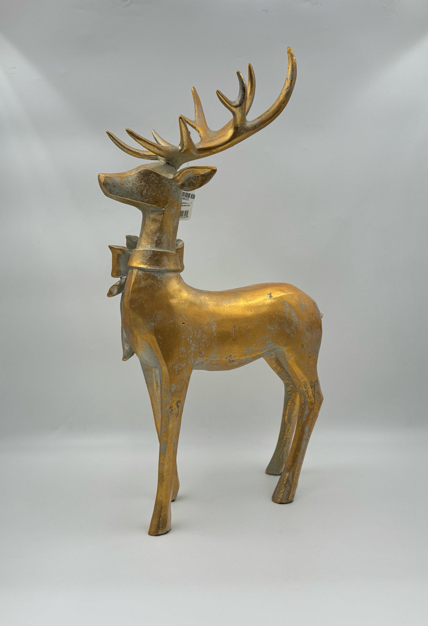 RAZ Imports  Aged Gold Reindeer with Bow – Resin Holiday Décor