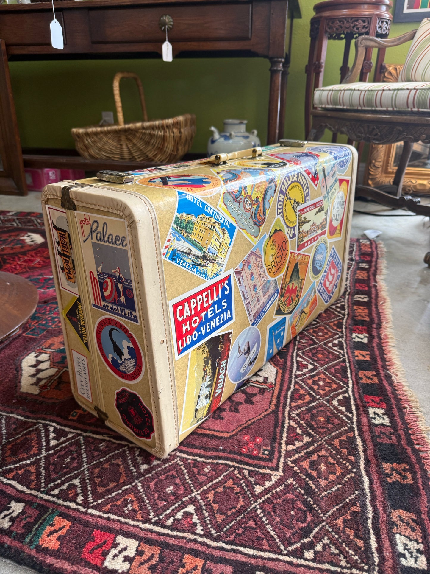 Vintage Suitcase With Travel Stickers