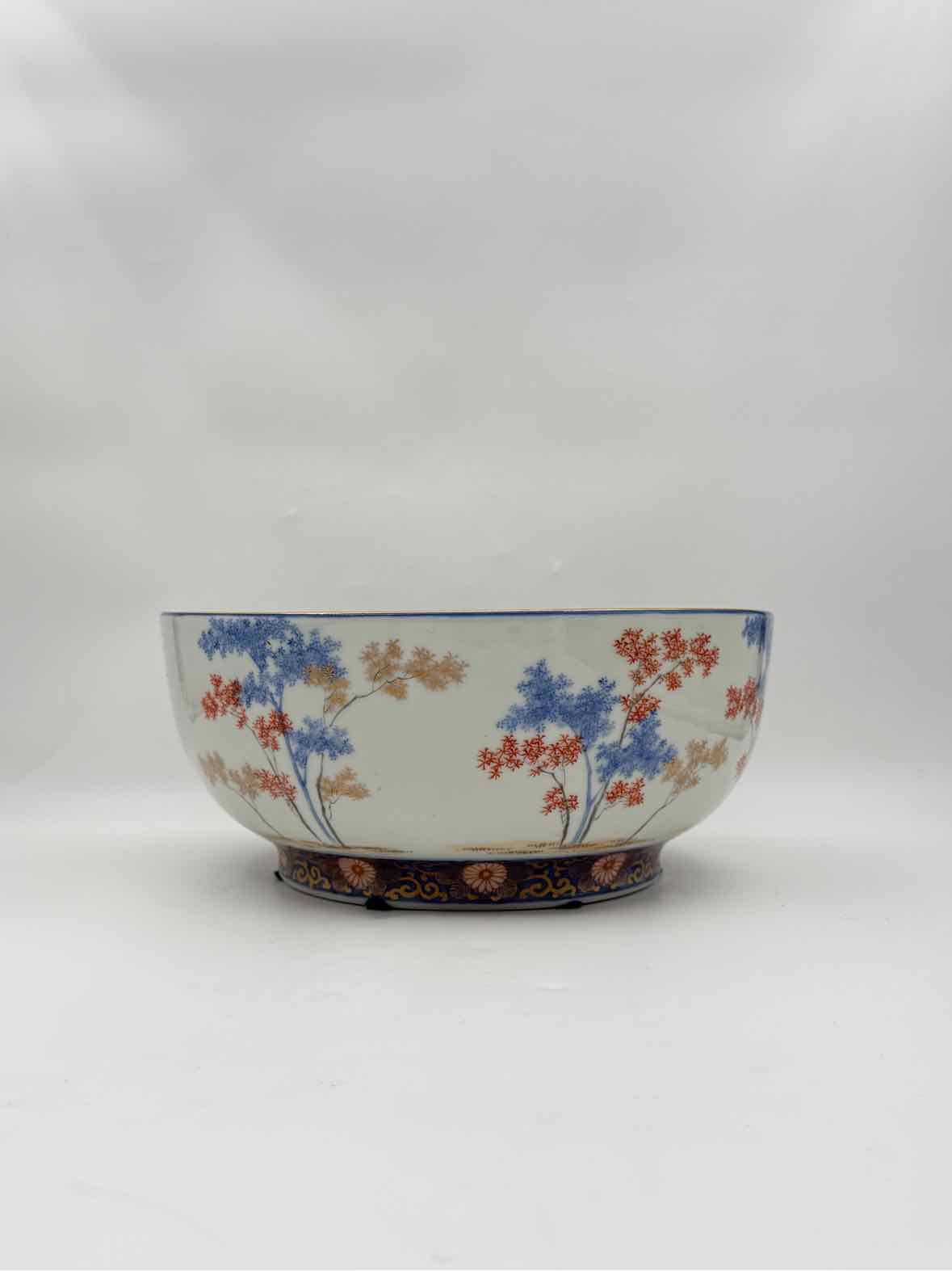 Japanese Porcelain Bowl with Blue & Rust Tree Motif Decorative Art