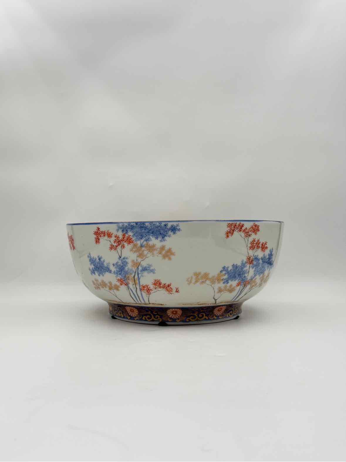 Japanese Porcelain Bowl with Blue & Rust Tree Motif Decorative Art