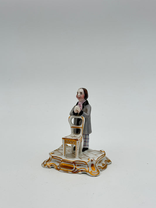 Vintage Hand-Painted Porcelain Figurine - Man with Chair on Ornate Base, Gold Accents