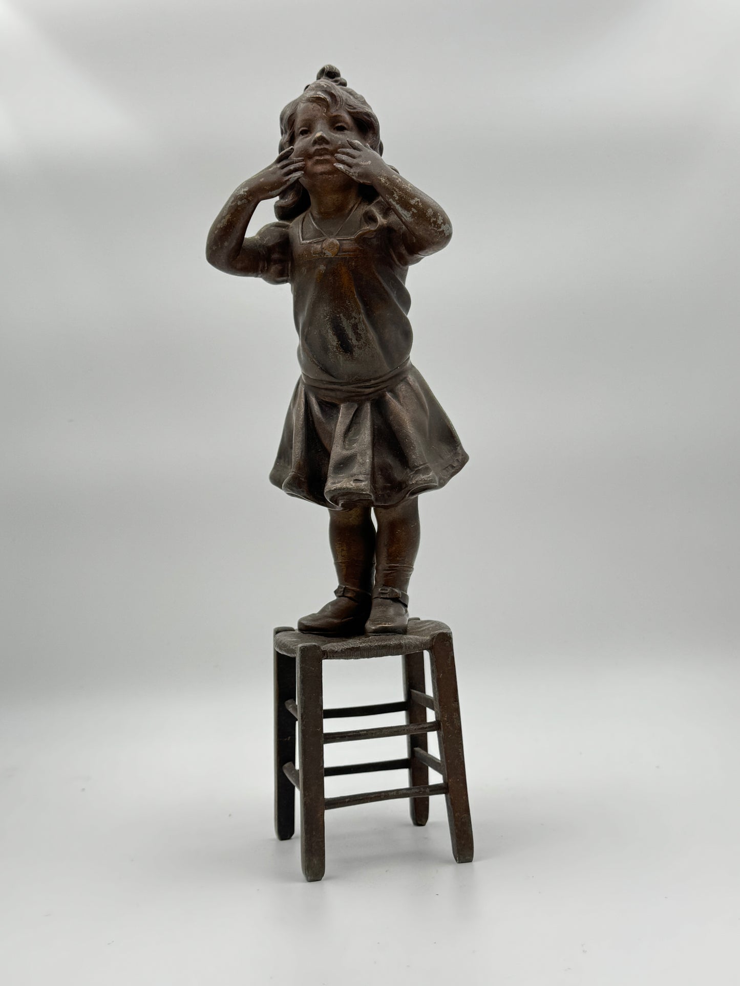 Vintage Patinated Metal Sculpture of a Girl Standing on a Chair