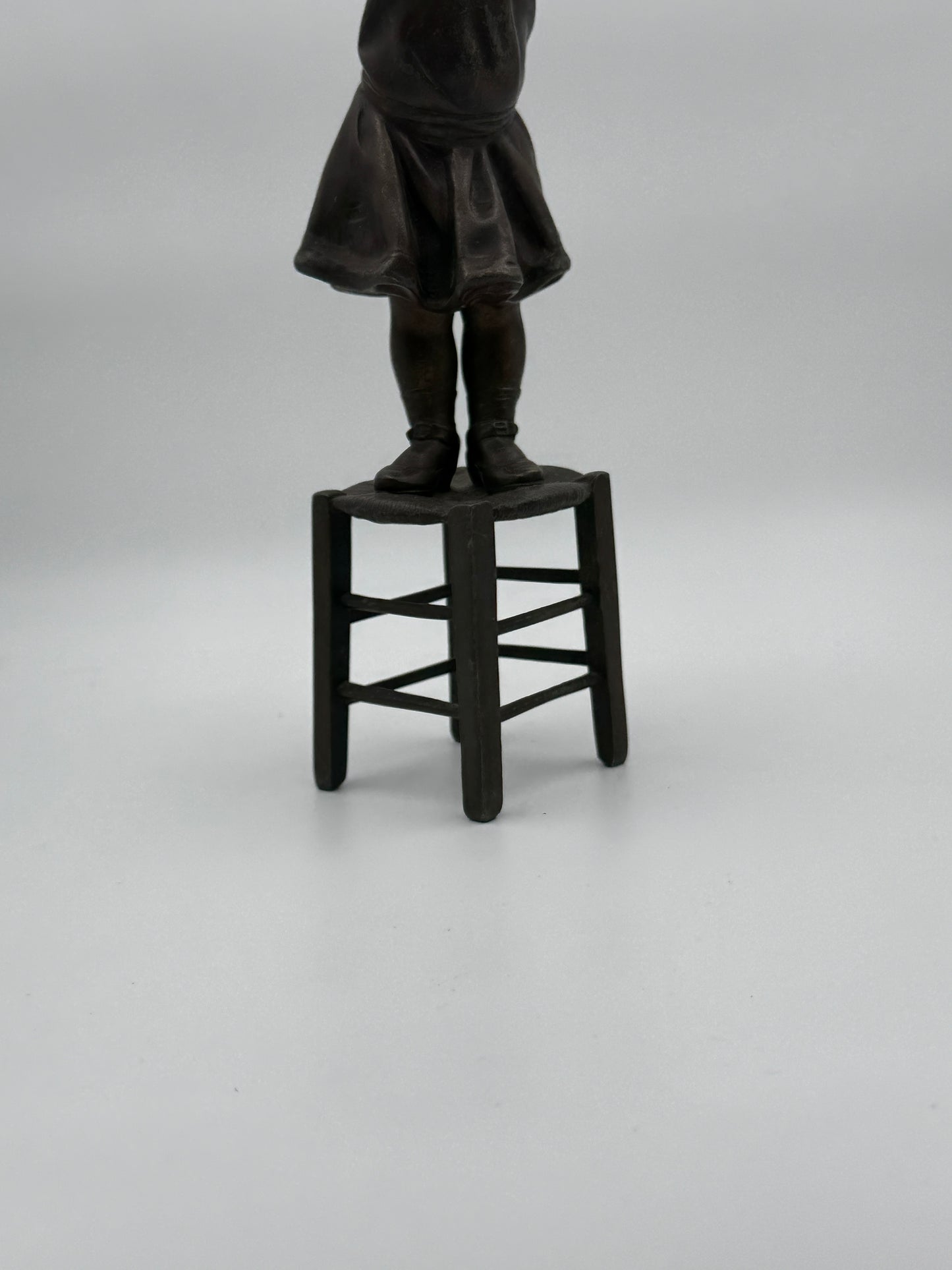 Vintage Patinated Metal Sculpture of a Girl Standing on a Chair