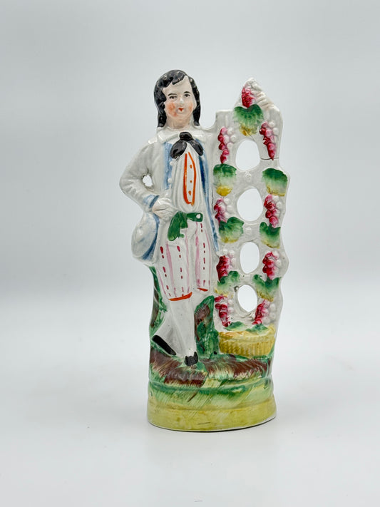 Antique Staffordshire Pottery Figure of a Man Standing by a Grape Arbor – 19th-Century English Collectible