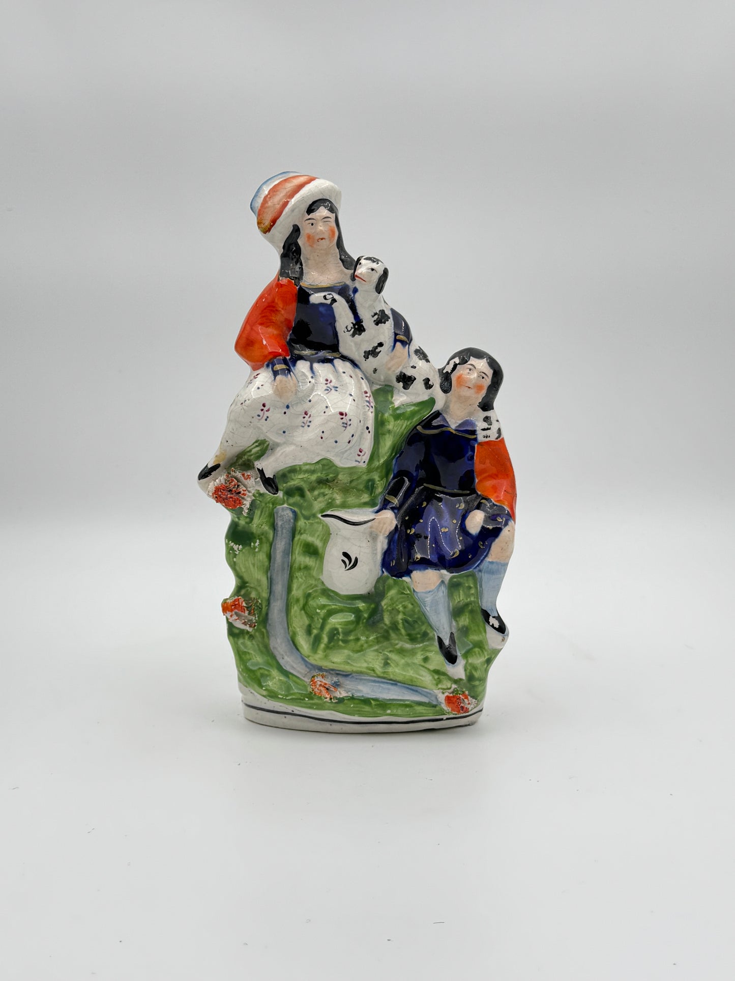 Antique Staffordshire Pottery Figurine – Woman with Dog and Man in Vibrant 19th-Century Scene