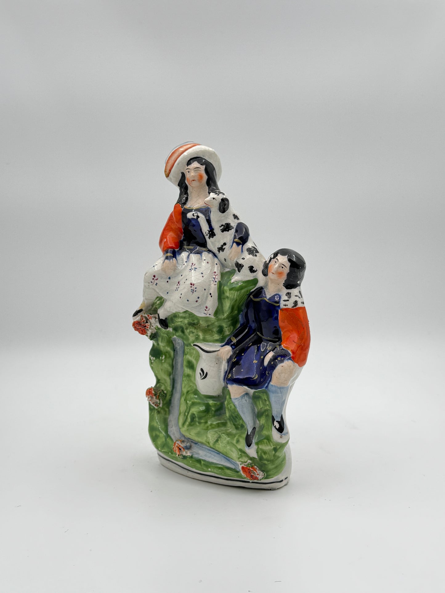 Antique Staffordshire Pottery Figurine – Woman with Dog and Man in Vibrant 19th-Century Scene