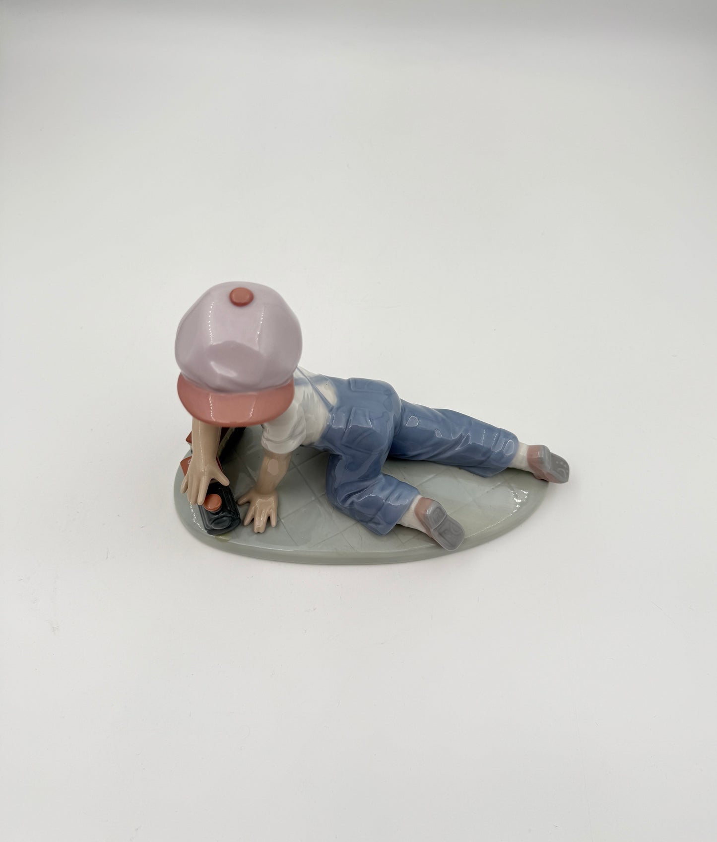 Lladró “All Aboard” #7619 Boy with Train Figurine
