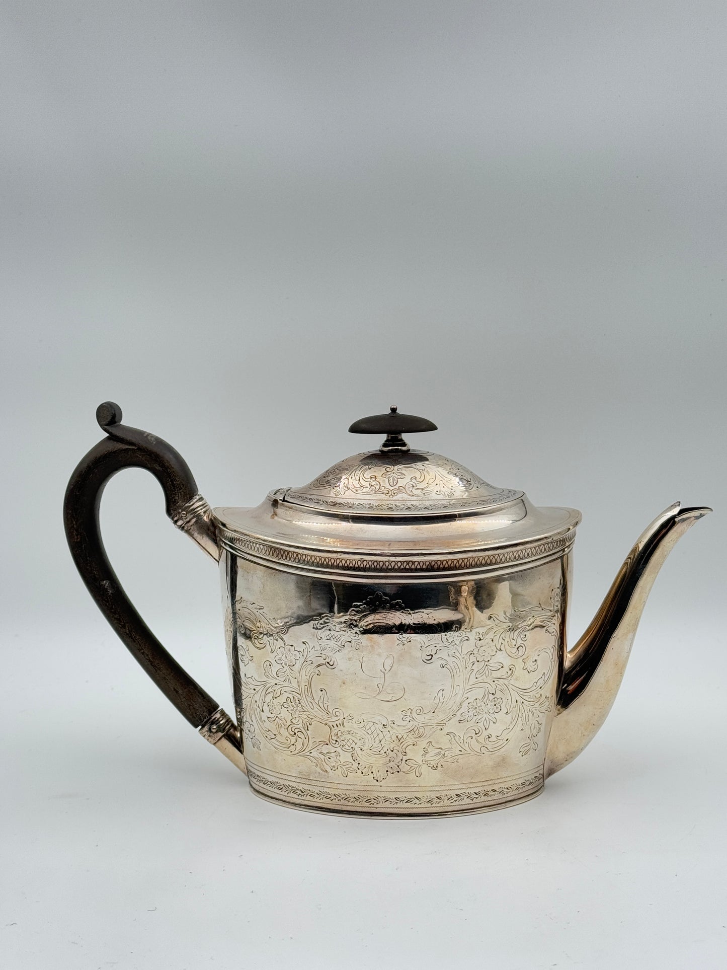 Antique Sterling Silver Teapot – Ornate Floral Engraving & Wooden Handle