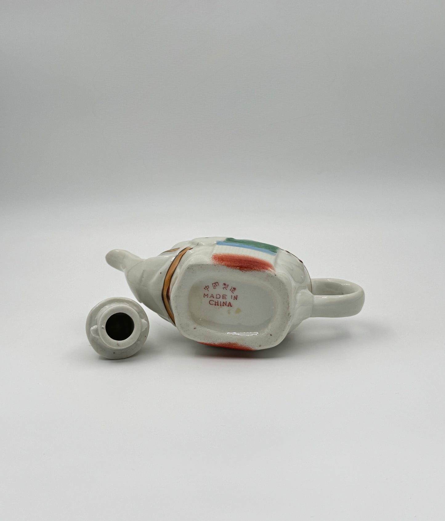 Pair of Chinese Elephant Porcelain Teapots – Large & Small