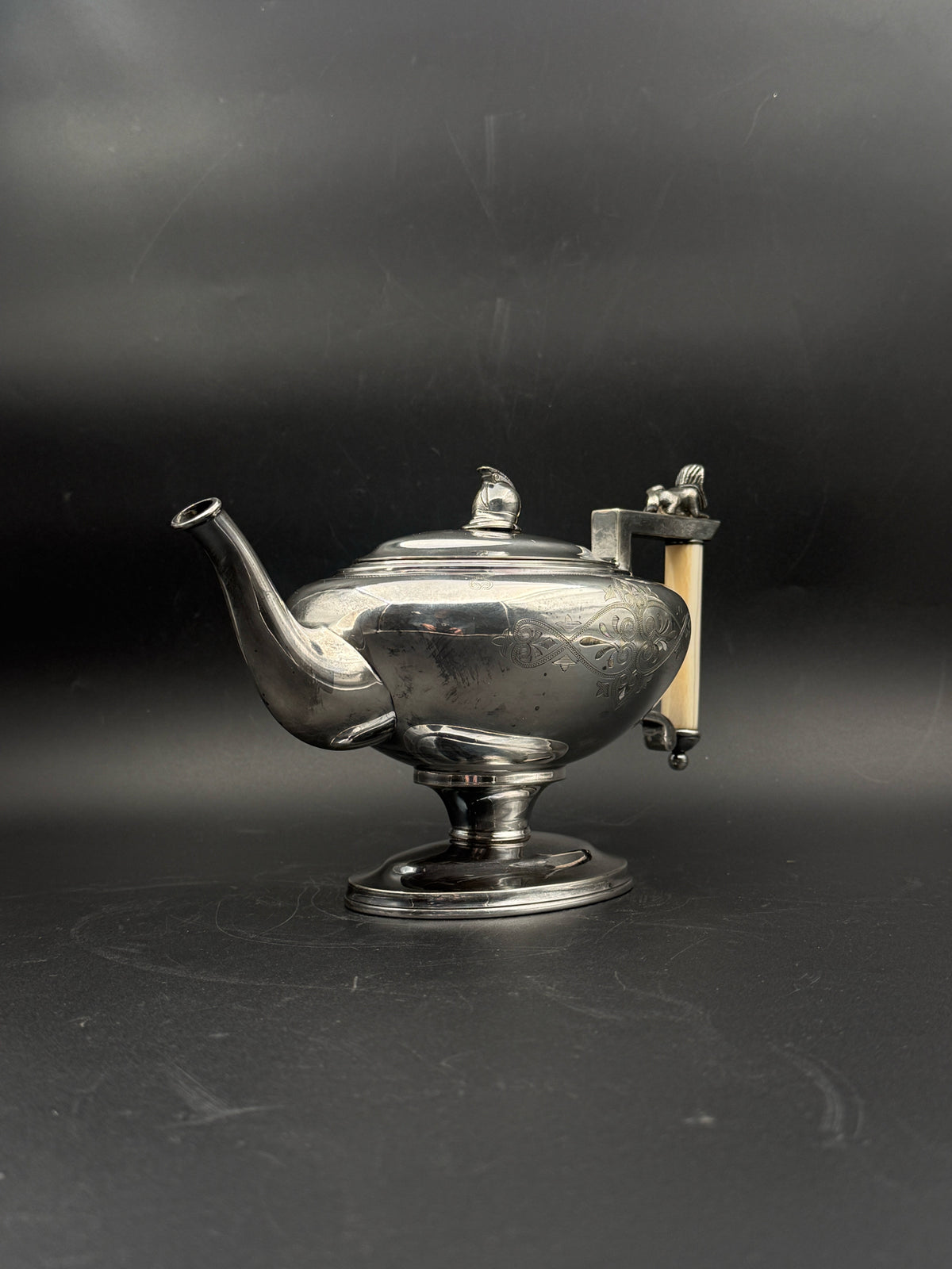 Meriden Silverplate Teapot With A Bone Handle And Sphinx Detail