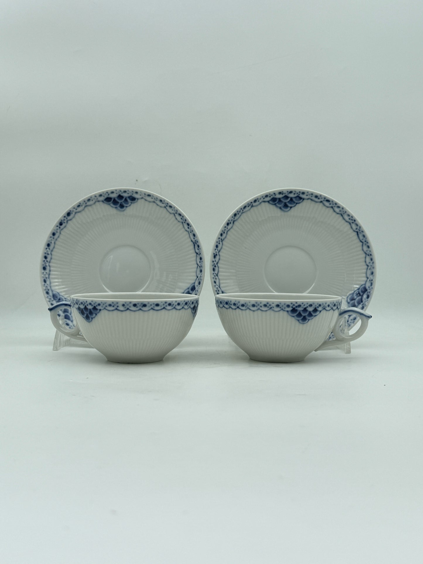Royal Copenhagen Blue Fluted Half Lace Teacup And Saucer- Set Of 2