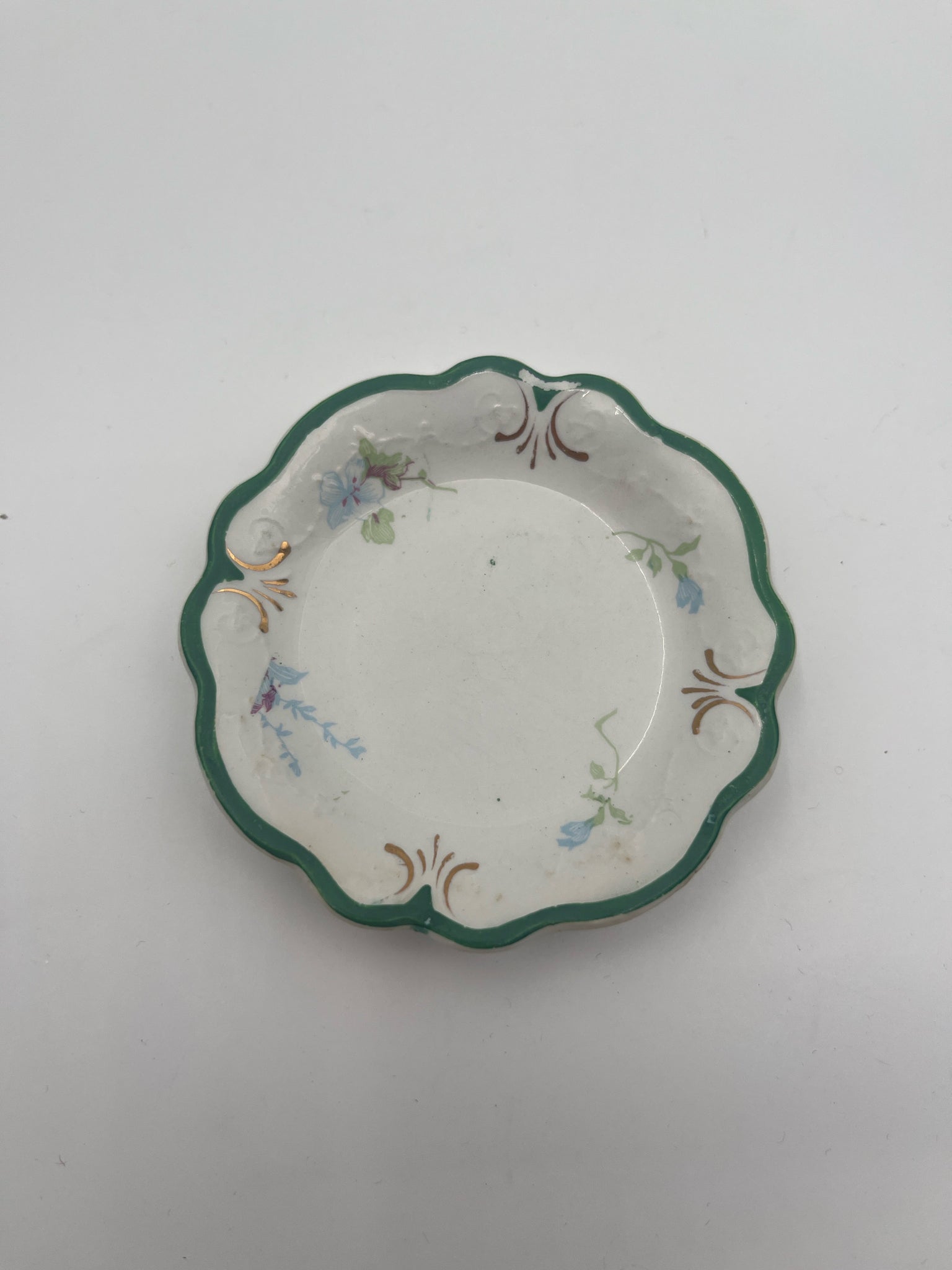 W.H. Grindley English Butter Pat – Green Rim with Floral Motif