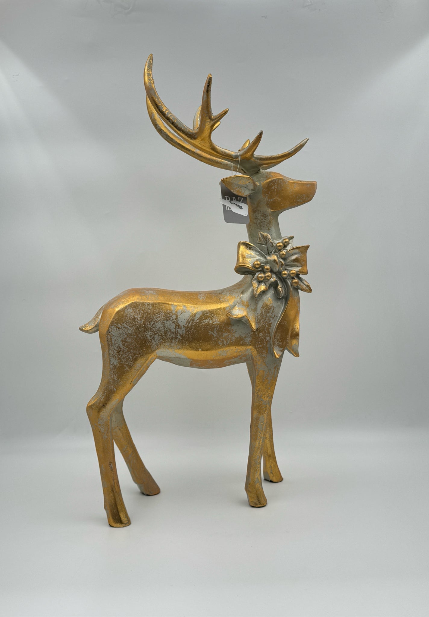RAZ Imports  Aged Gold Reindeer with Bow – Resin Holiday Décor