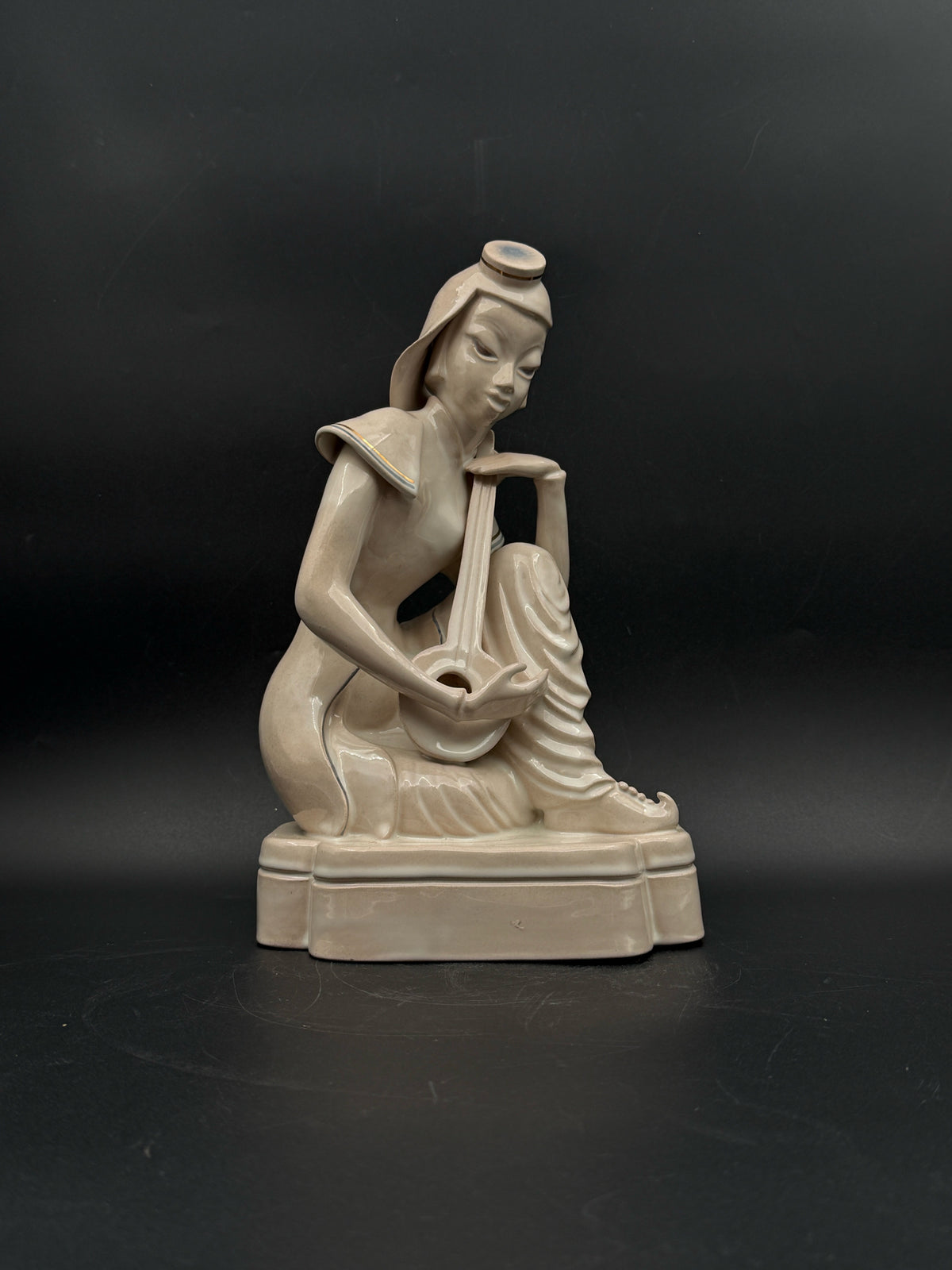 Japanese Woman Playing A Shamisen