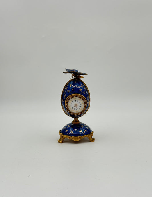 Blue Enamel Egg Clock with Butterfly Top – Gilt Accents